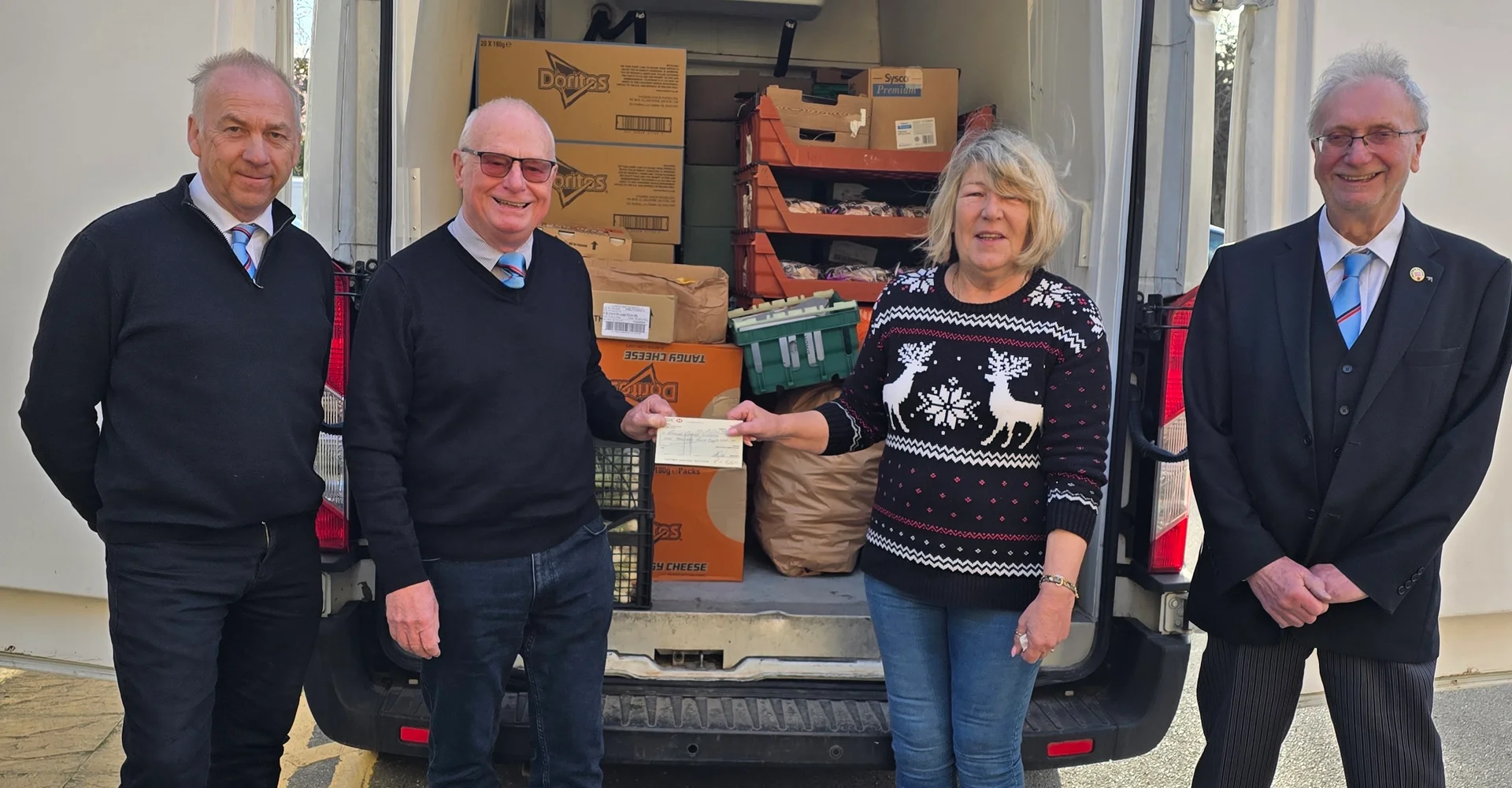 Freemasons bring Christmas cheer to Wisbech foodbank with £4,000 donation